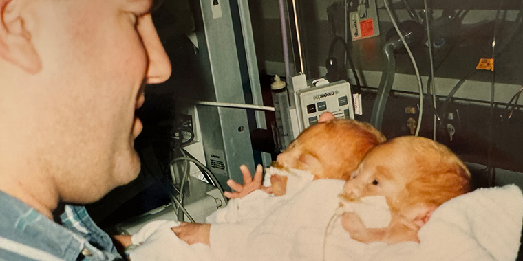 David Weisoly, DO, with newborn twin sons